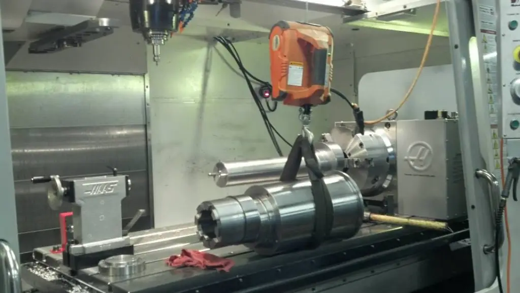 Shaft set up on a fourth-axis rotary in a CNC mill