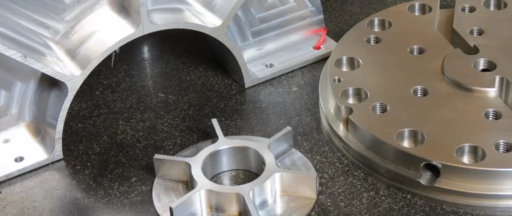 Machined aluminum components and an impeller