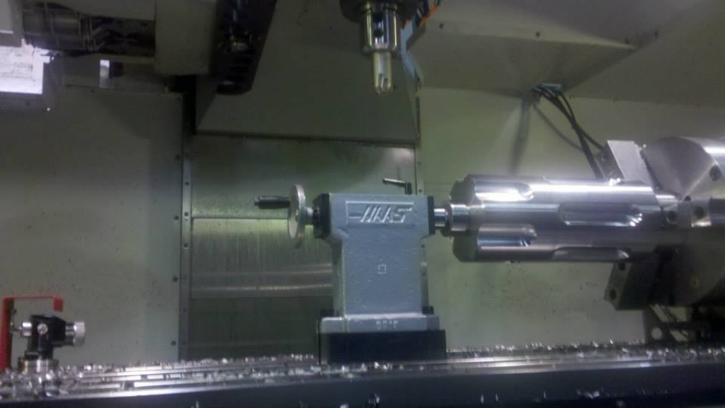 Shaft supported by a tailstock in a CNC mill